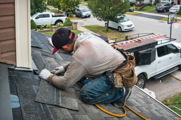 Professional Emergency Roof Repair technician working in Bloxom, VA